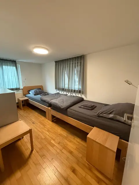 Schlafzimmer mit zwei Einzelbetten der Ferienwohnung Ammerbuch